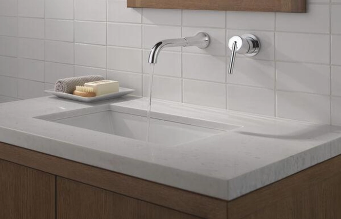 Delta wall mount bathroom faucet modern design for residential bathrooms