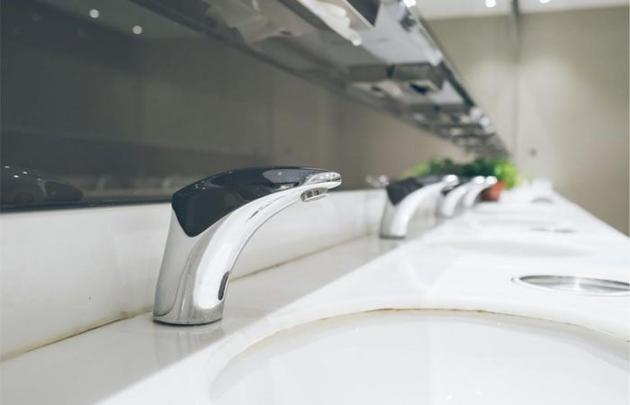 commercial bathroom touchless faucet installation modern restroom