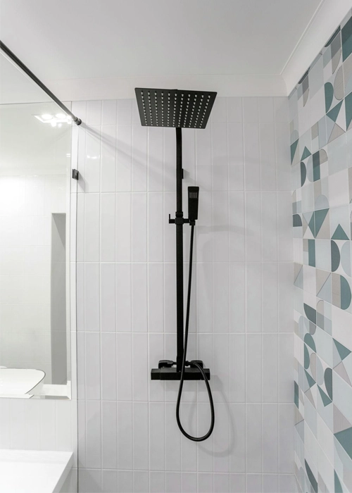 Modern rainfall shower system with sleek contemporary bathroom design